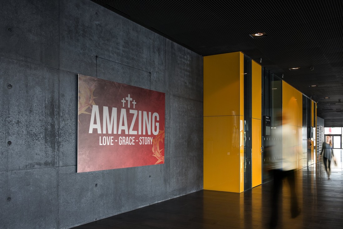 Amazing - Love, Grace, Story Easter poster designed by BCreativ, shown on display